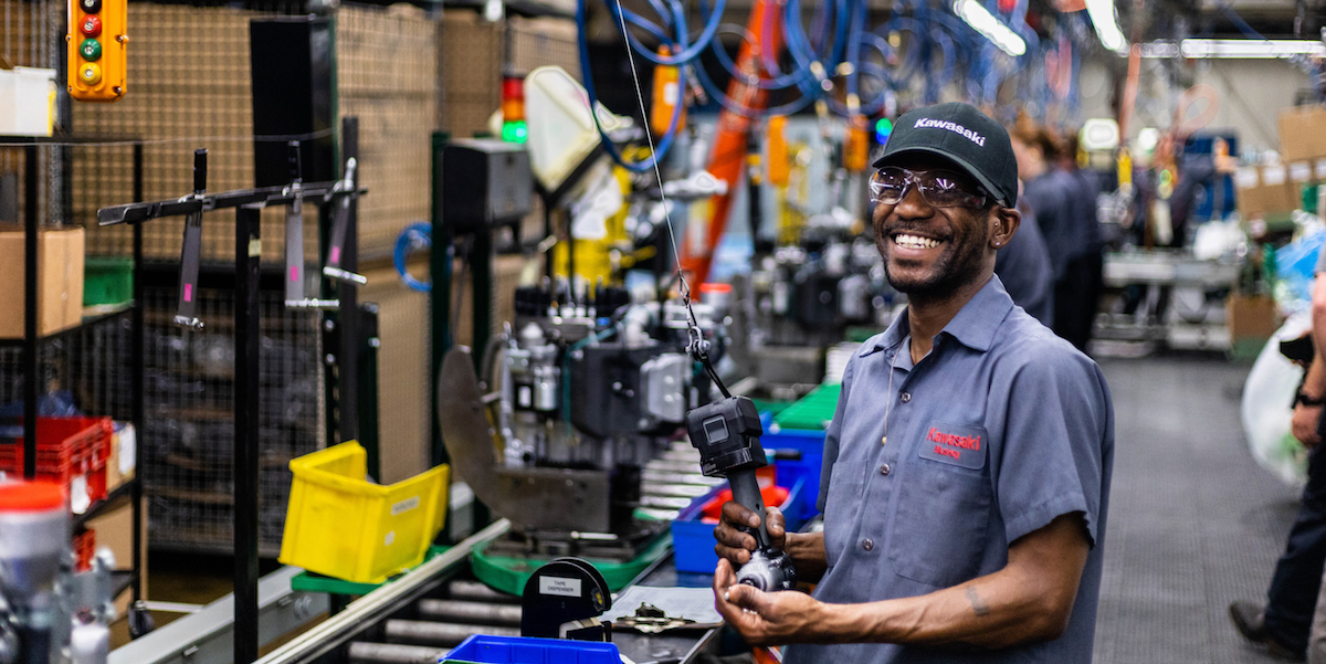 man on kawasaki assembly line