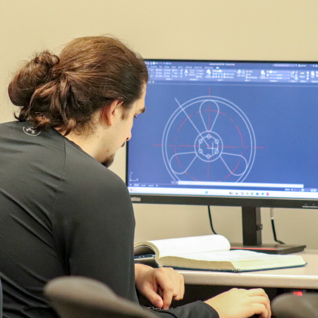 Student working on CAD File for Doe Run