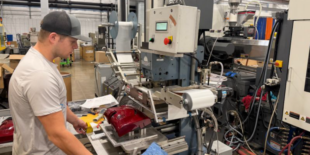 4 Process Employee working on machine