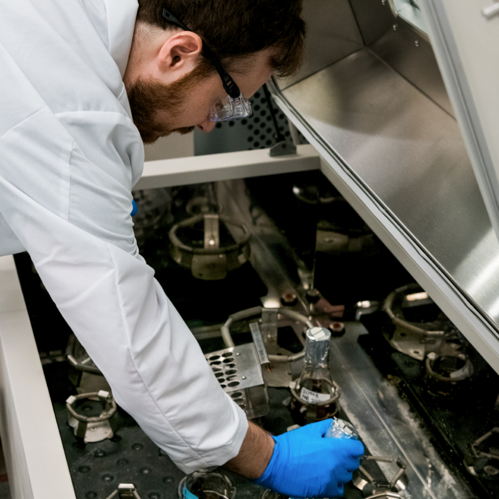 Image of Elemental Enzyme employee working on lab equipment