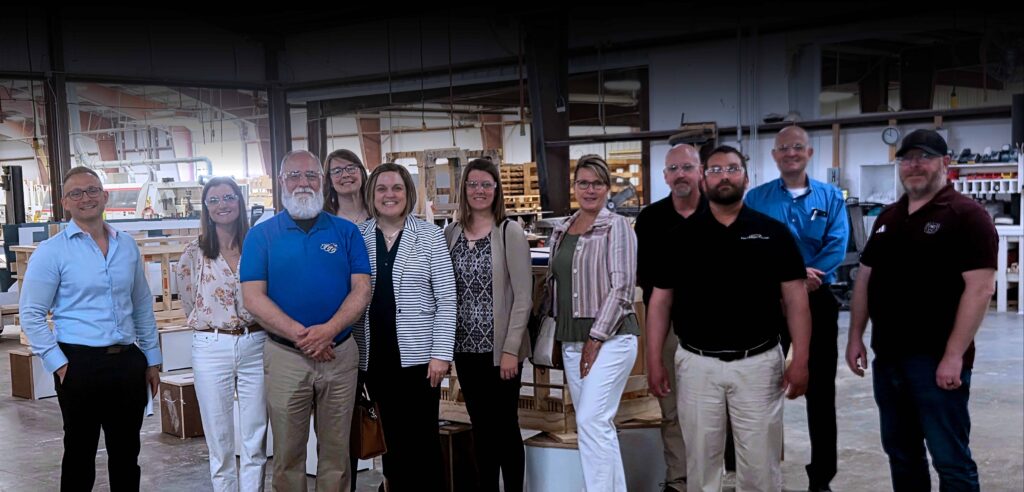 Group Photo of people at Cohen Woodworking Facility